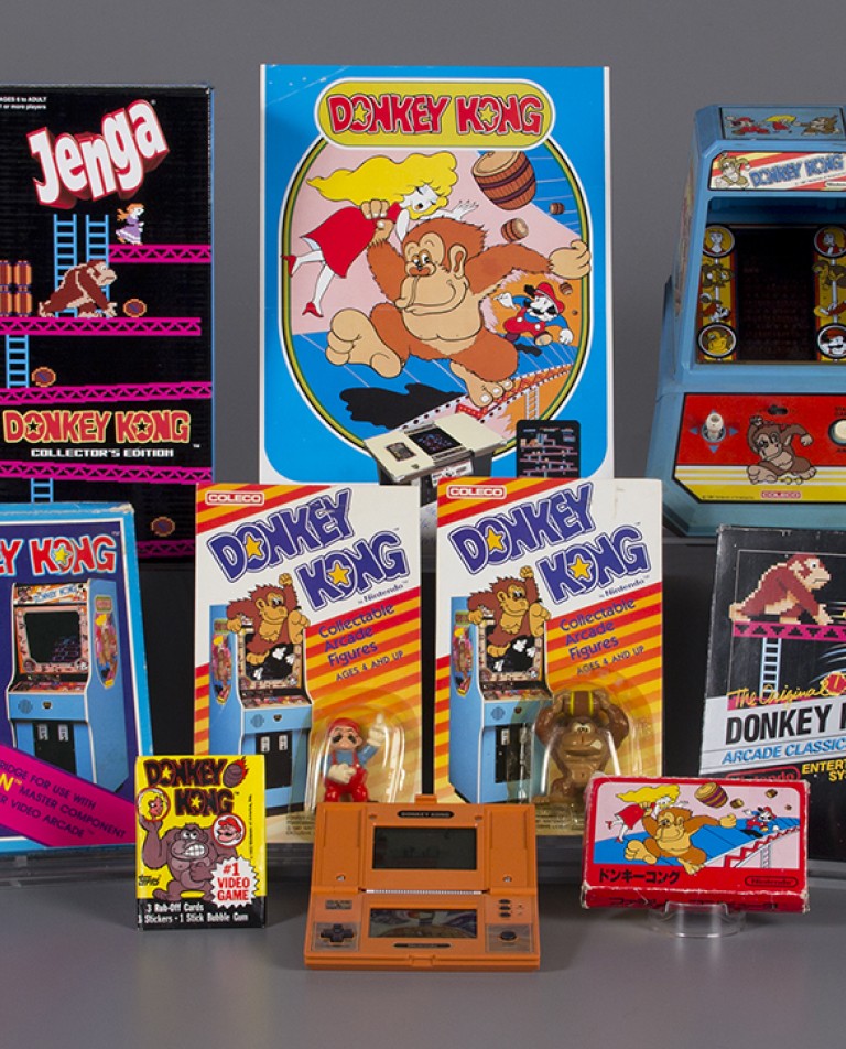 Donkey Kong video games and related memorabilia arranged together.
