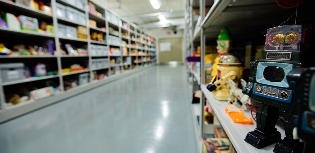 Toys on shelves in museum storage