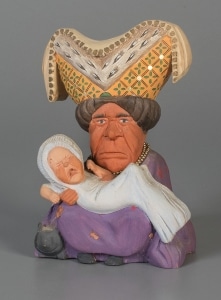 Duchess figure with crying baby, 1948, gift of Glen Cubitt. The Strong, Rochester, New York.