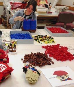 Bethany building LEGO Mario, The Strong, Rochester, New York