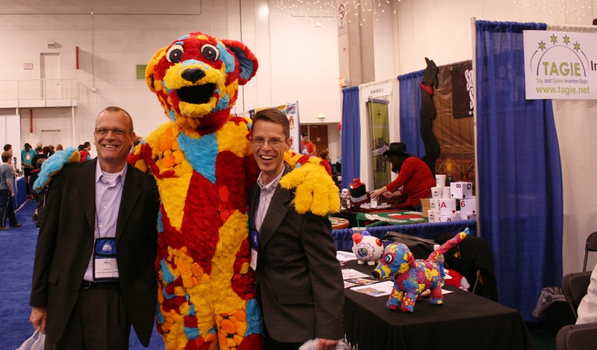 Nic and Chris pose with Art Dog at the Chicago Toy and Game Fair.