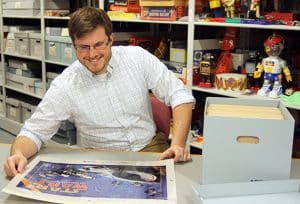 Dane with a Star Wars sell sheet, The Strong, Rochester, New York