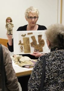 Darlene Gengelbach explaining doll conservation, The Strong, Rochester, New York