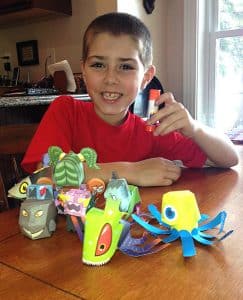 Dylan with his monster pals, courtesy of Pam and Dylan DuLong.