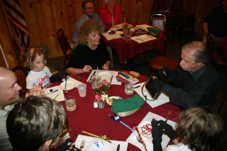 While guests waited for their food, they played some games involving gloves, purses, gum, and—oh, never mind. You had to be there. 