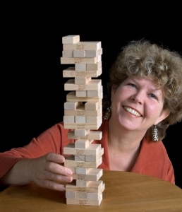 Leslie Scott and Jenga, 2020, photo by Sue Macpherson ARPS. The Strong, Rochester, New York.