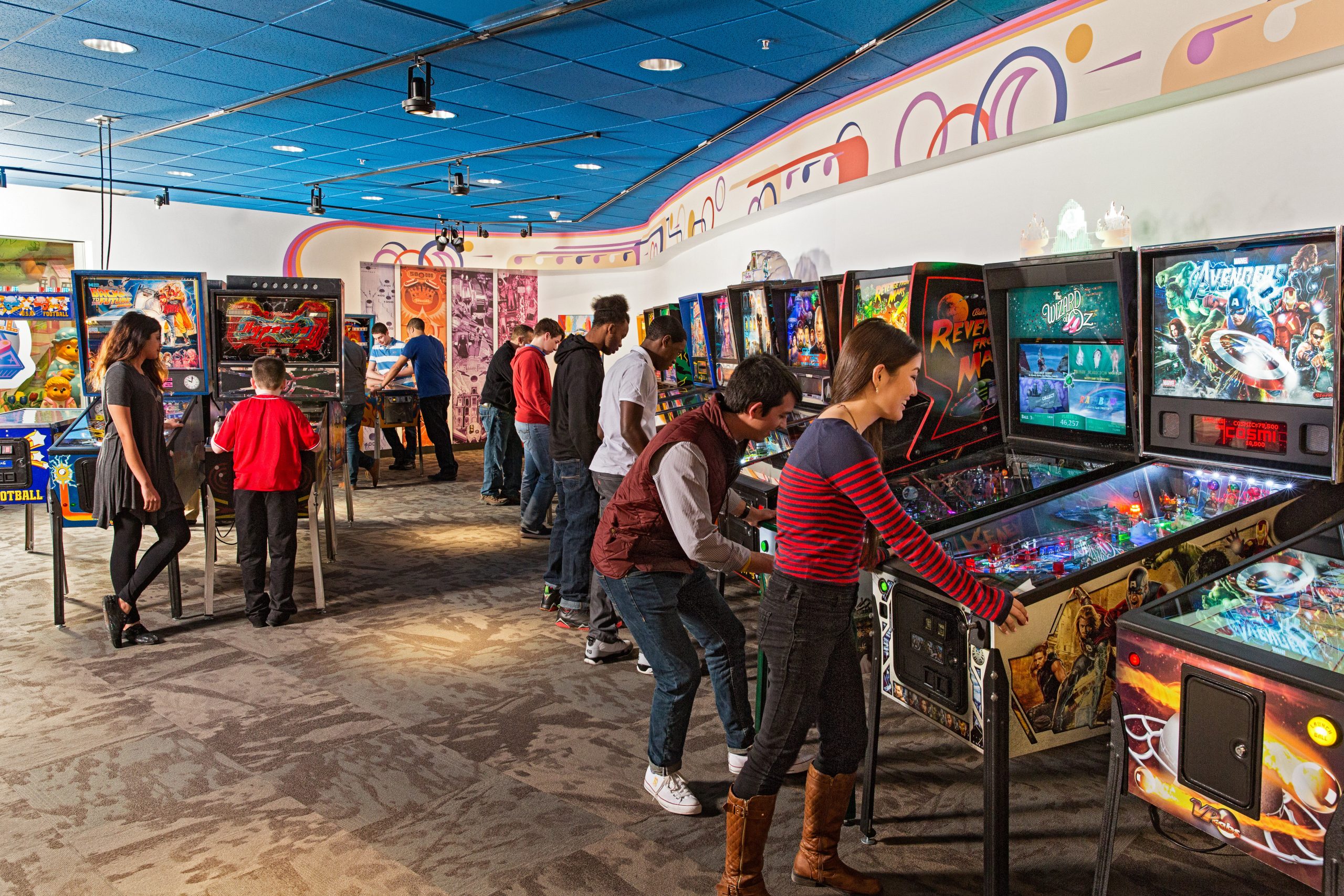 Guests playing pinball