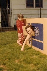 Playing in the GE Refrigerator Box, photograph, about 1970