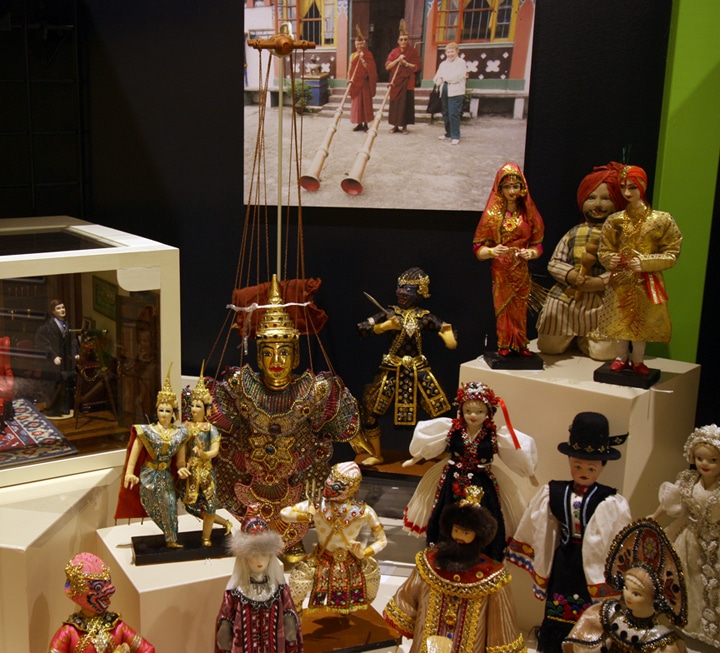 Installation view of Ruth Rosenfeld's miniatures and souvenir dolls, gift in honor of Ruth Rosenfeld, from the collection of Strong National Museum of Play.