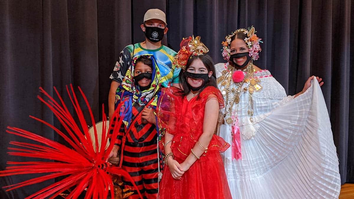 Performance group in traditional hispanic costumes