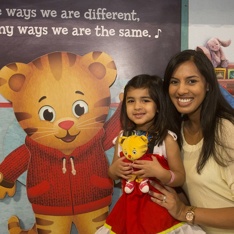 Mom and daughter in Daniel Tiger exhibit