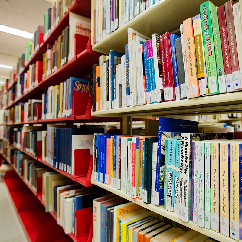 Stacks of library books