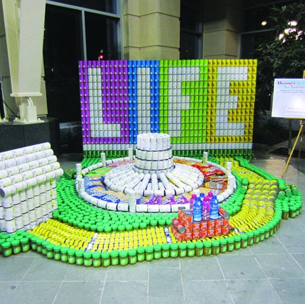 Canstruction sculpture of the game "LIFE"