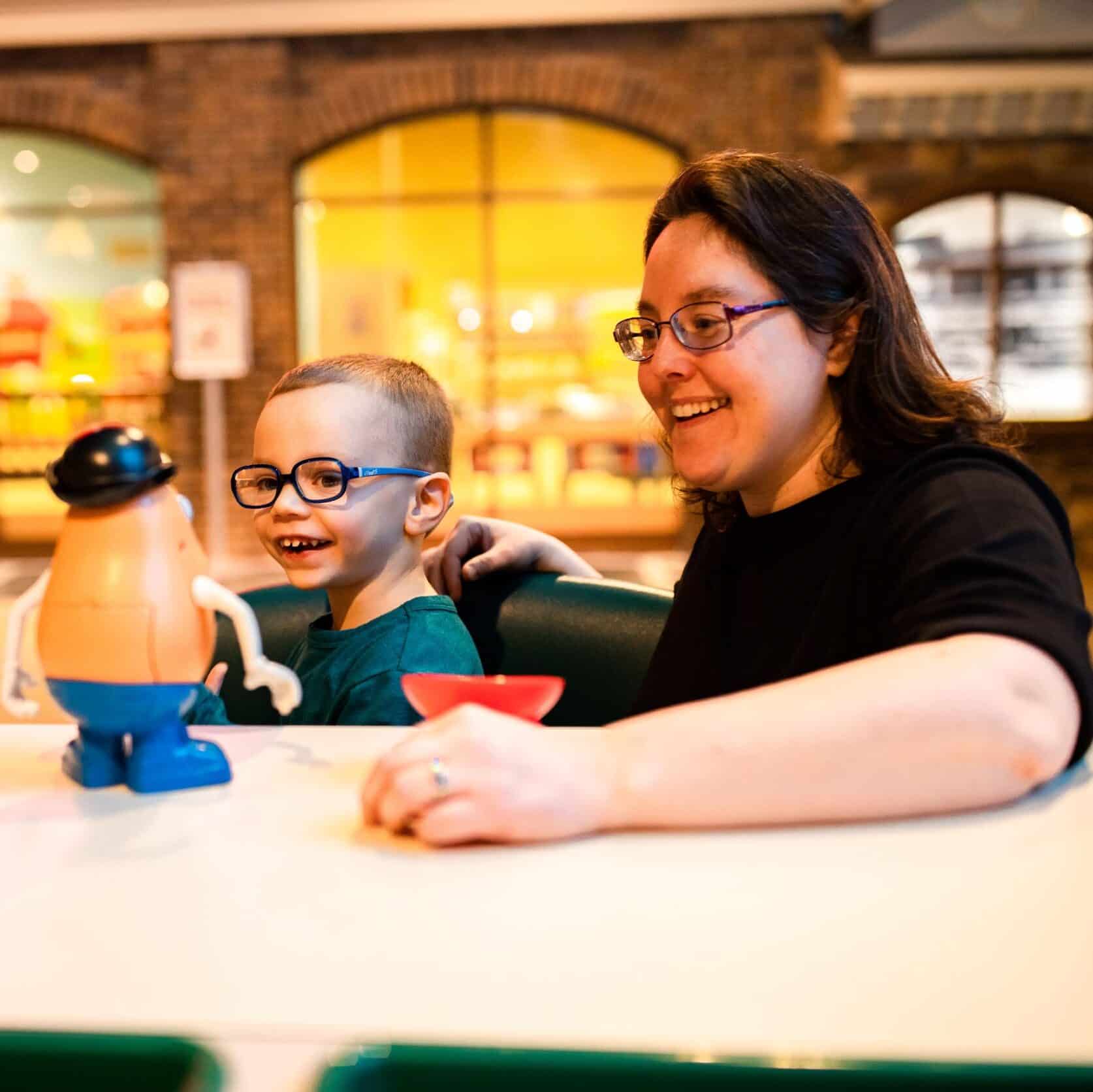 Sensory Friendly family playing in front of Wegmans