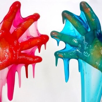 Hands filled with colored slime