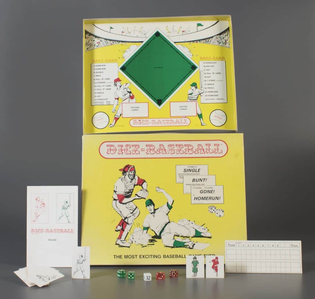 From left: cards; manual; batter card; diamond; two green dice; one numbered die; two red dice; green and red team cards; and scoreboard. 