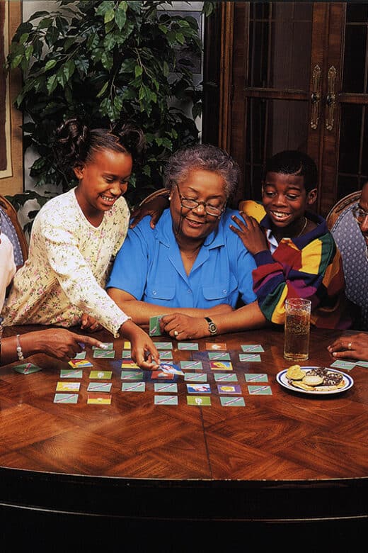 Black family playing a game