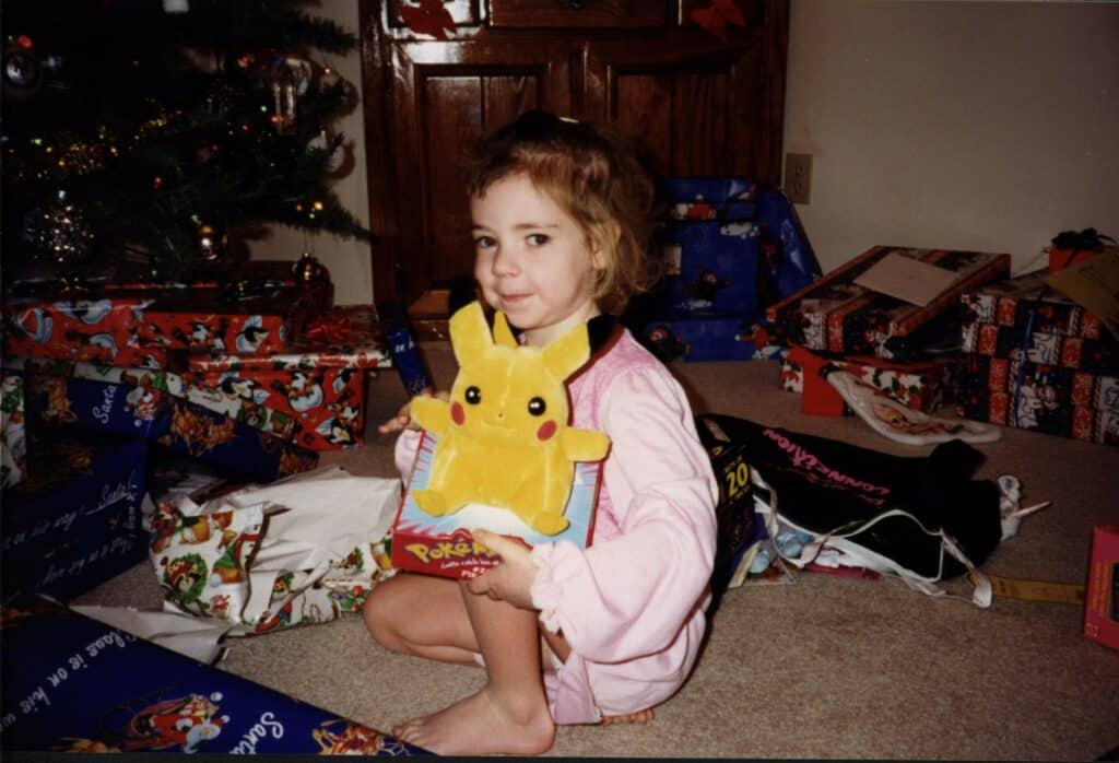 Picture of Picture of Young girl with a Pikachu stuffed animal for Christmas, 1999, gift of Kristy Allen Hisert. The Strong National Museum of Play, Rochester, New York.