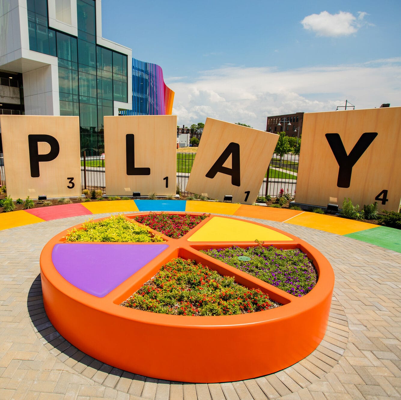 Giant Scrabble Tiles spelling out the word play