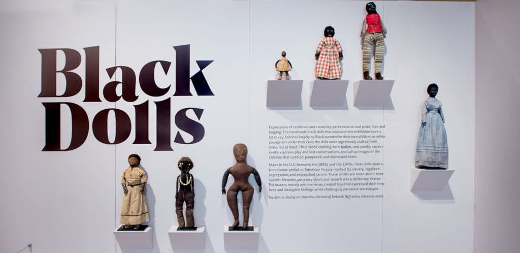 Black Dolls exhibit title wall