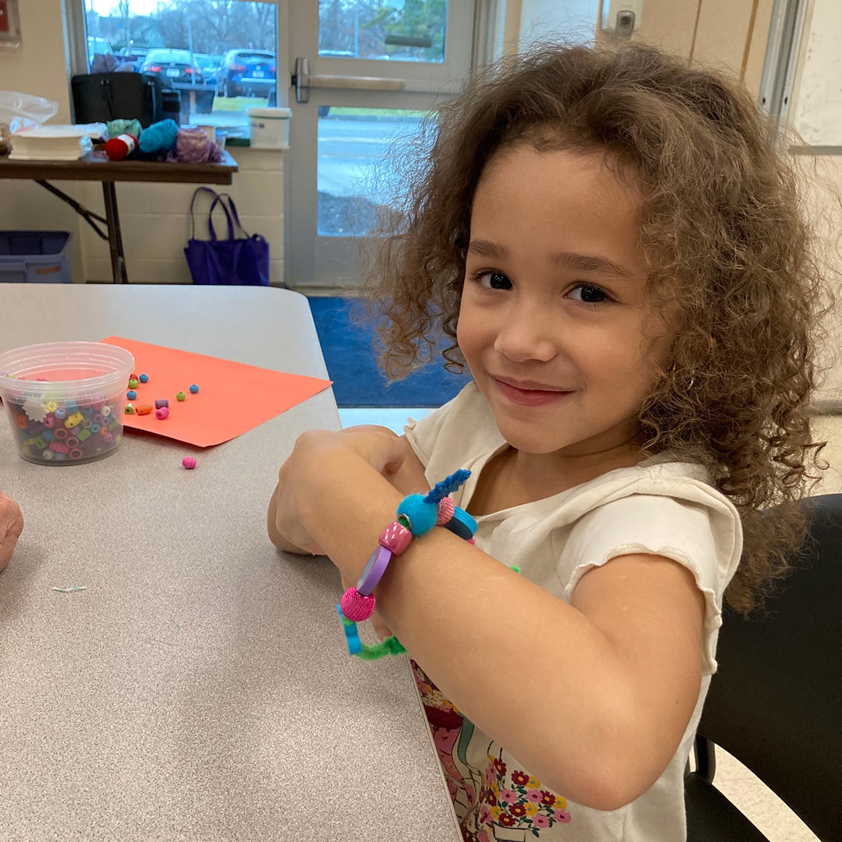 Girl wearing handmade bracelet