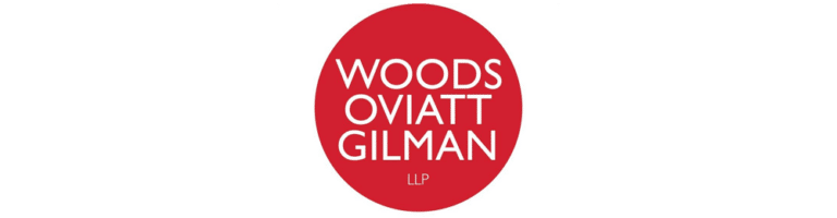 Woods Oviatt Gilman logo