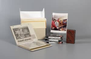 Selection of papers, VHS tapes, and materials from collection