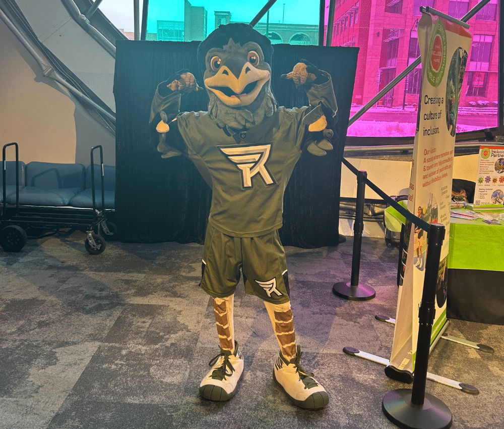 The Rochester Knighthawks mascot, Chopper, posing in the Adams Atrium