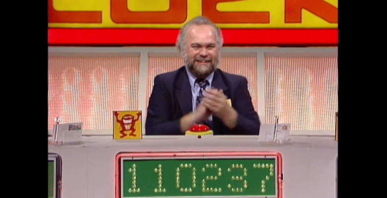 Michael Larson looking cheerful on the set of Press Your Luck, with 110,237 dollars on his board