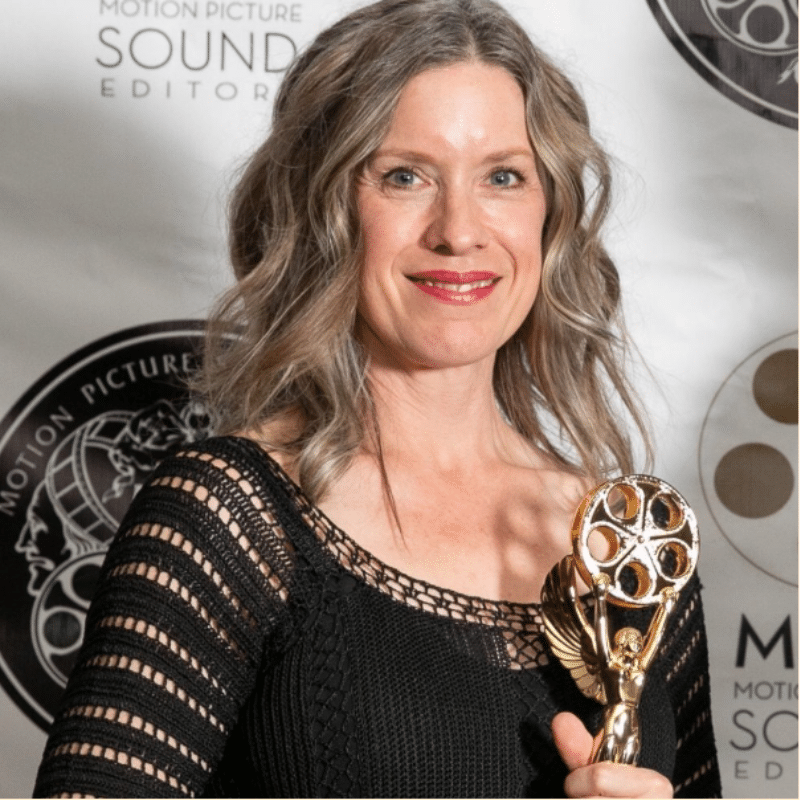 Headshot of foley artist Shelley Roden holding an award.