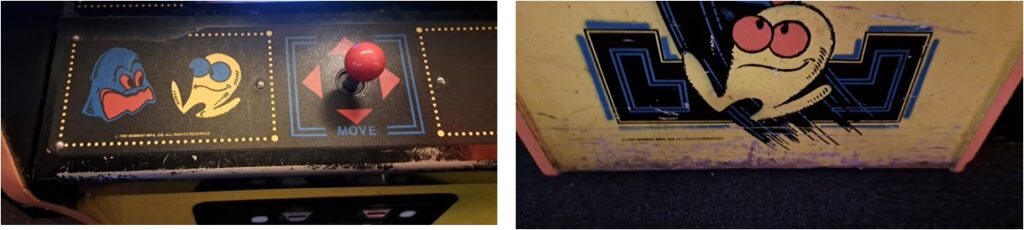 Close up of use wear on Pac-Man cabinet