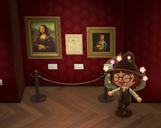 Posing with an art display. Screen capture of Animal Crossing: New Horizons, 2020 (captured 2026), courtesy of the author.