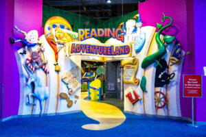 Entrance to Reading Adventureland with giant, pop-up characters