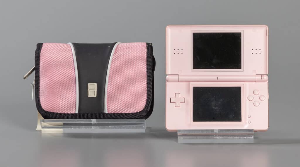 Nintendo DS lite with carrying case, 2006, gift of the Dubnik family, The Strong, Rochester, NY.