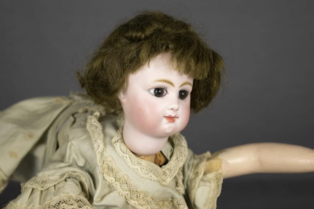 Close up of the bisque head.
"Ondine" Roulette & Decamps swimming automaton, Roulette & Decamps, late 19th century, The Strong National Museum of Play, Rochester, New York.